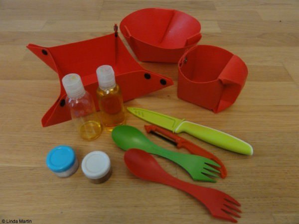 Our kitchen equipment included Orikaso plates, sporks, a peeler, and a knife. 