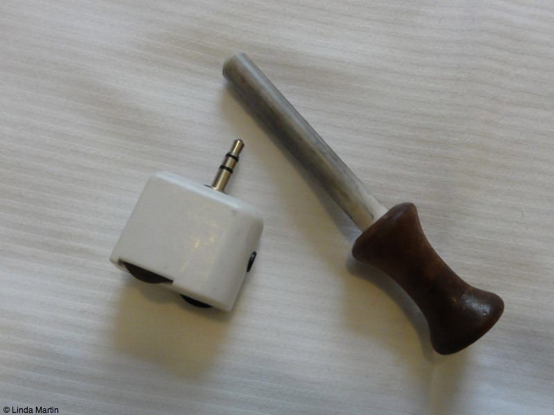 Knife sharpener and double adaptor.