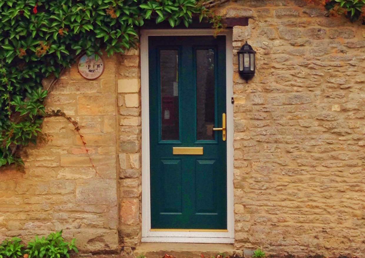 Uk front door with ivy
