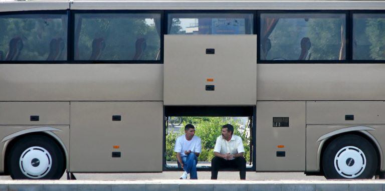 Put your bag under the bus.