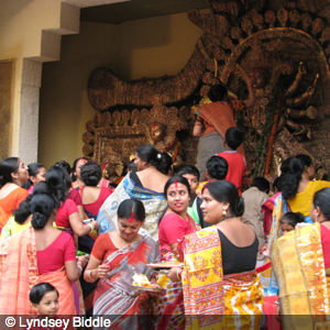 Durga Puja: A Bengali Tradition 2 Women at the Pandal on Damami - Durga Puja festival - square