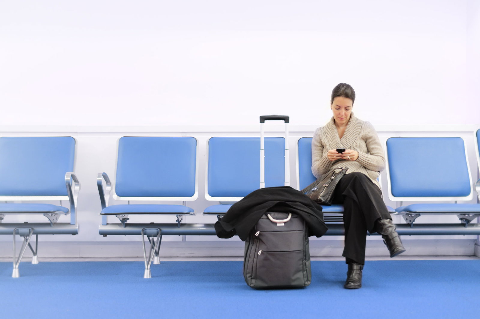 Waiting Traveller Using Smartphone