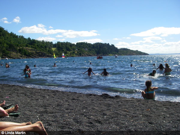 chile pucon lakeside playing - Best places in South America podcast