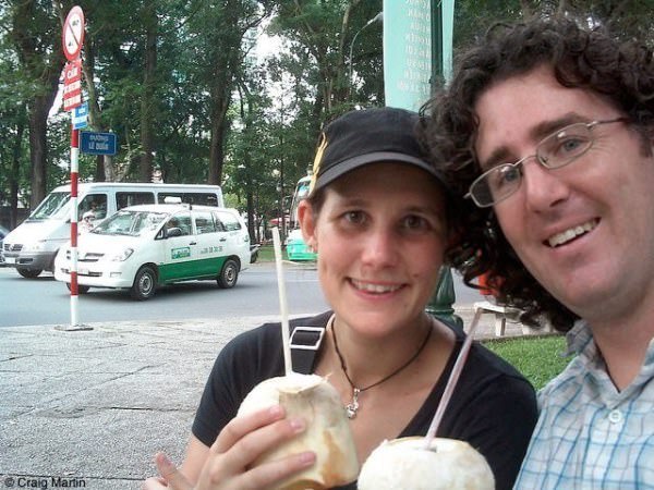 drinking from a coconut in saigon ho chi minh city vietnam