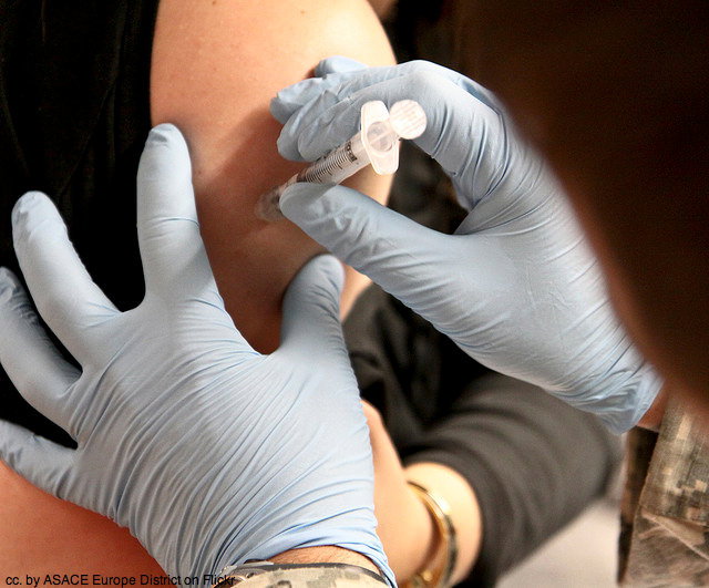 flu vaccination doctor - Health and safety in Asia podcast: Is it safe to travel in Asia?