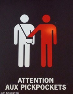 how to avoid pickpockets attention sign - How to avoid pickpockets and bag-snatchers as you travel - 12+ Expert Tips