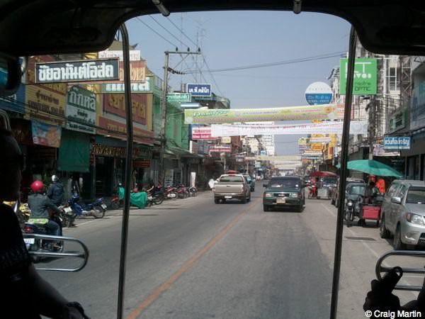 stray backpacker bus thailand laos - view from a song theau